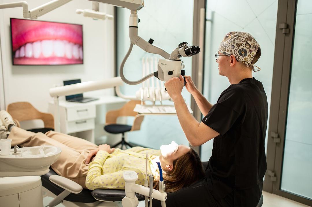 Sky dental clinic doctor performing procedure